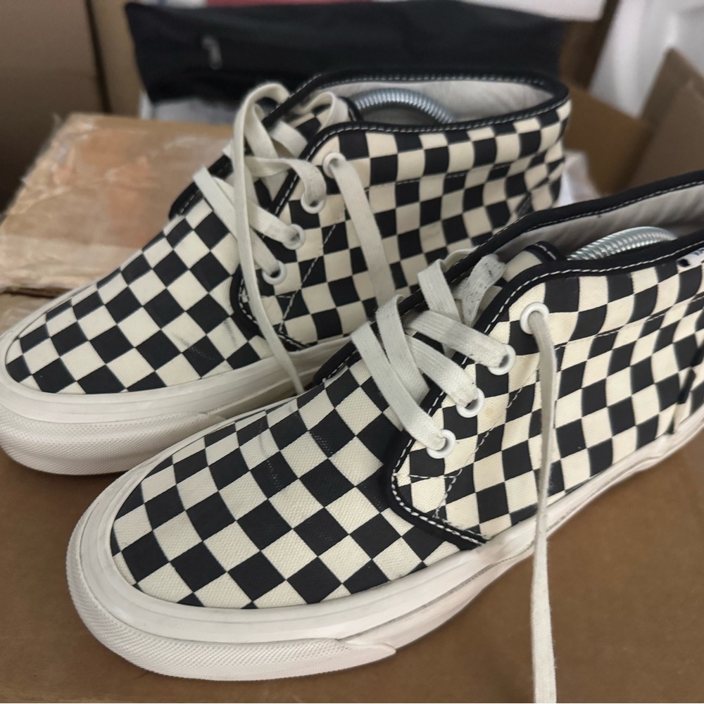 Vans Checkered High-Top Sneakers
German style
